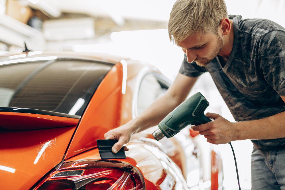 car-wrapping-with-foil-drying-with-fan-car-service-1-1