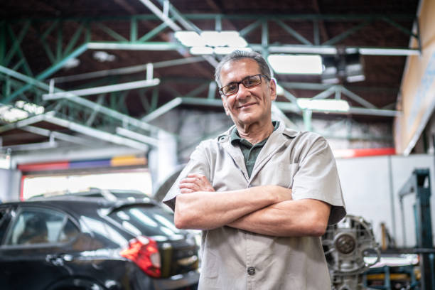 Portrait of a auto mechanic man on a repair shop